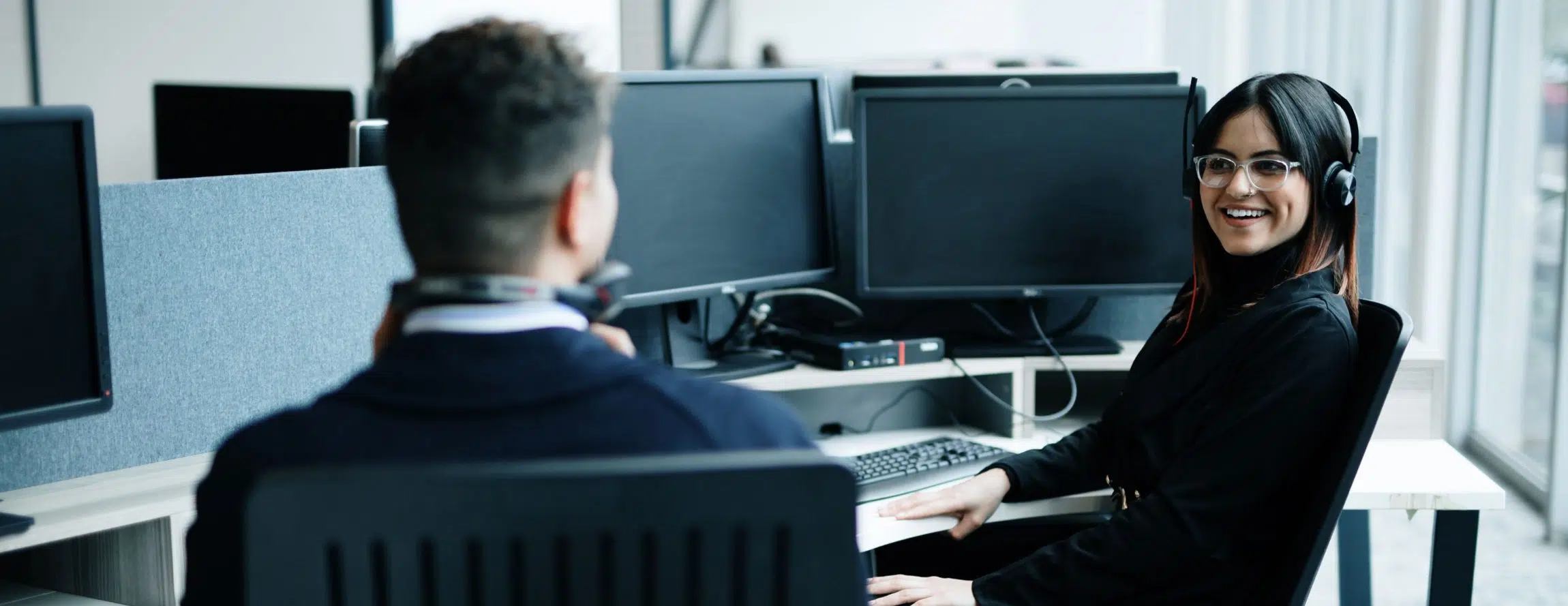 The Think Tank's Professional Services Sectors page banner that features two employees collaborating in an office space.