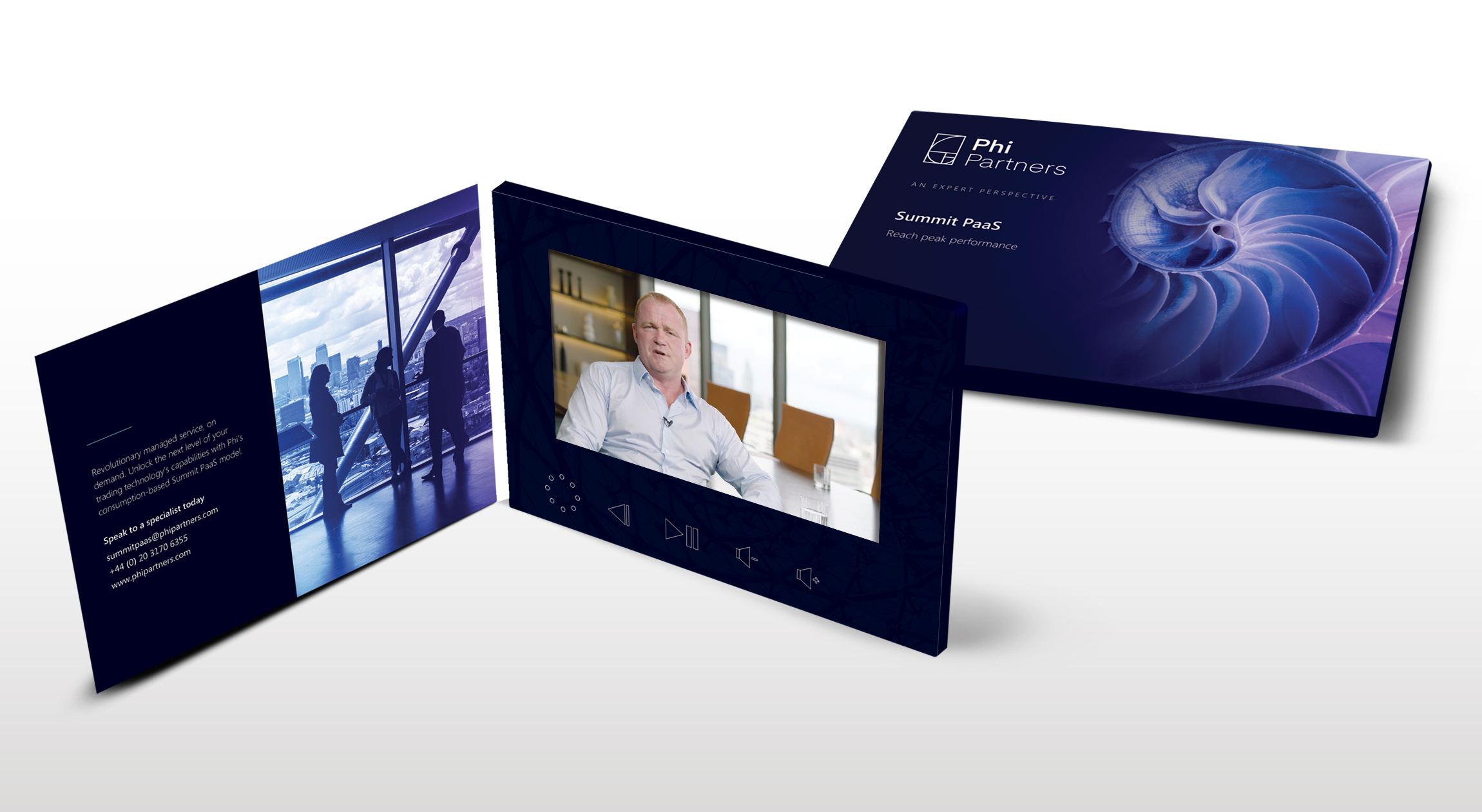 A blue Phi Partners Summit PaaS video card, revealing a video screen with a man speaking. The front cover features a nautilus shell design. Assets part of the campaign "Reach Peak Performance" by Phi Partners and The Think Tank, a marketing agency in London.