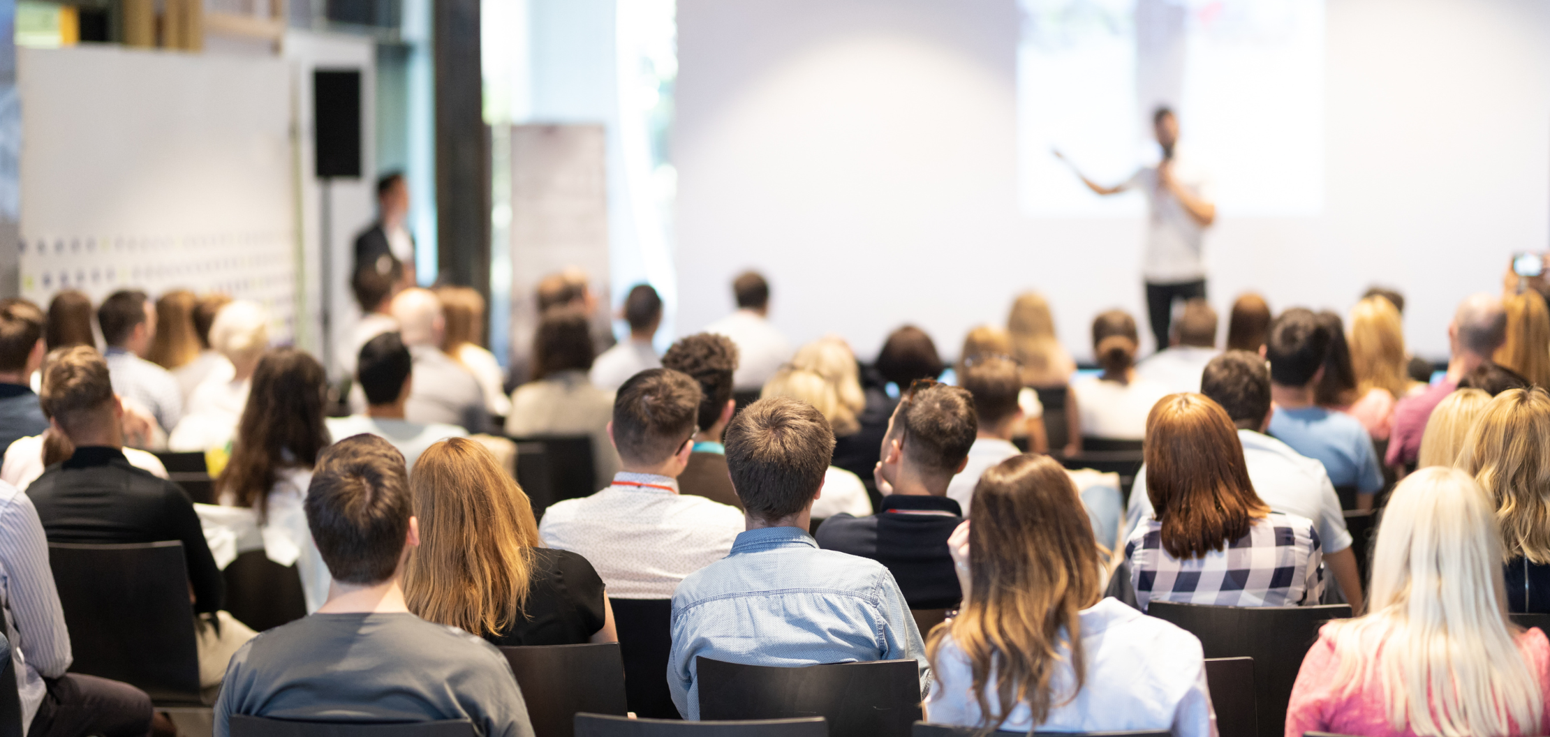 An image of a conference where there is speaker talking, part of the influencer marketing blog post, written by The Think Tank, a marketing agency in london
