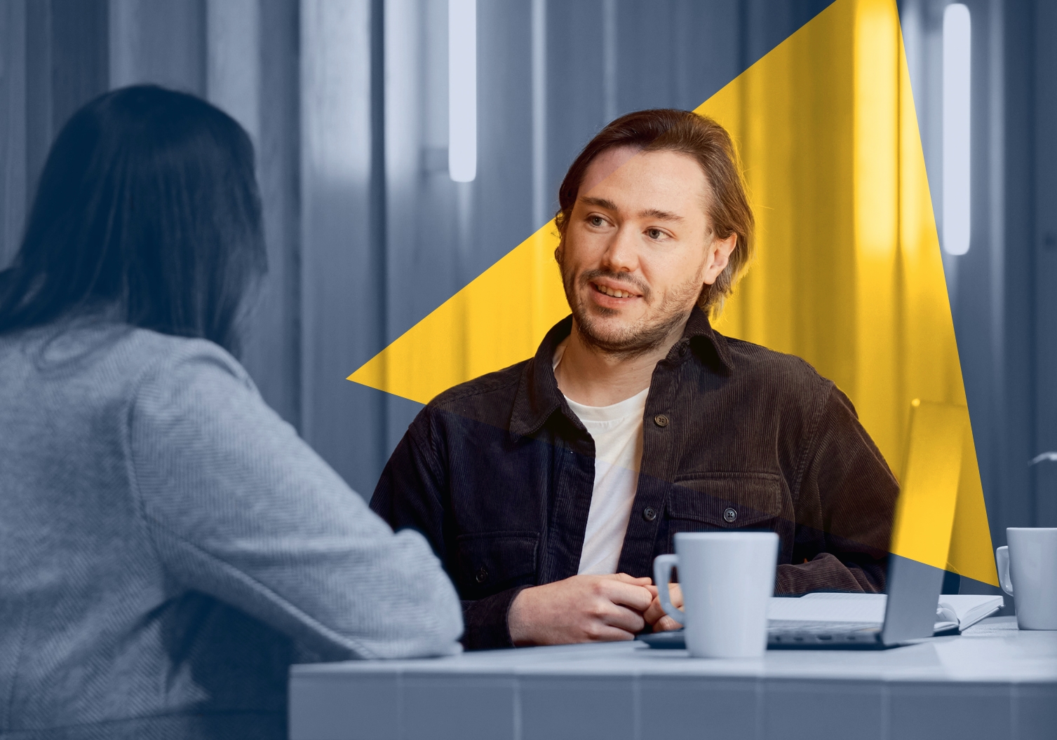 PPC Manager Charlie Watkins at The Think Tank PR & Marketing Agency in Think Tank's brand blue and yellow image treatment.