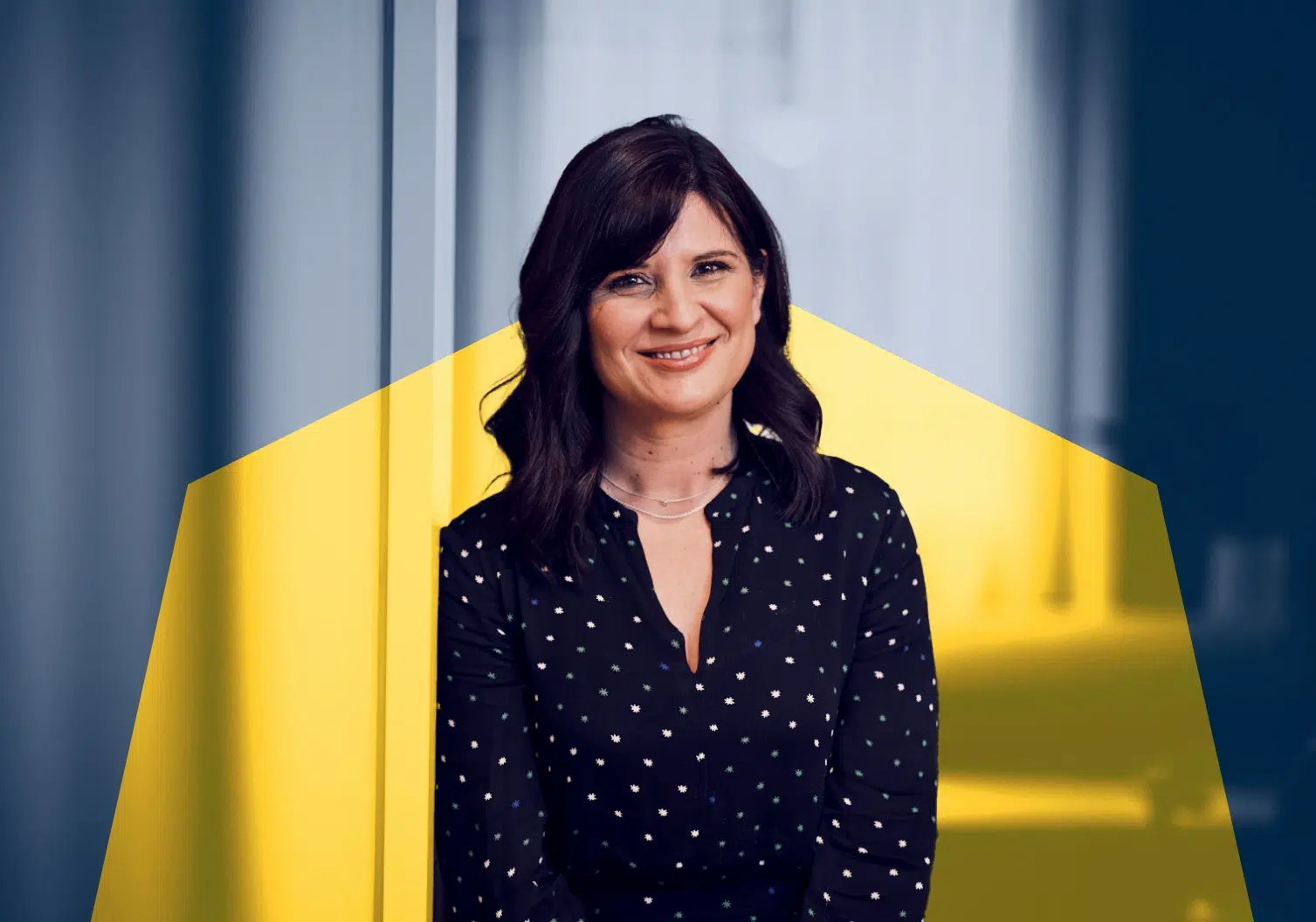 Dragana Knezevic Client Services Director at The Think Tank PR & Marketing Agency in Think Tank's brand blue and yellow image treatment.