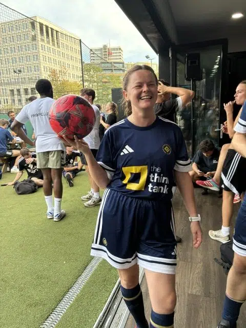 Jasmine stood with football